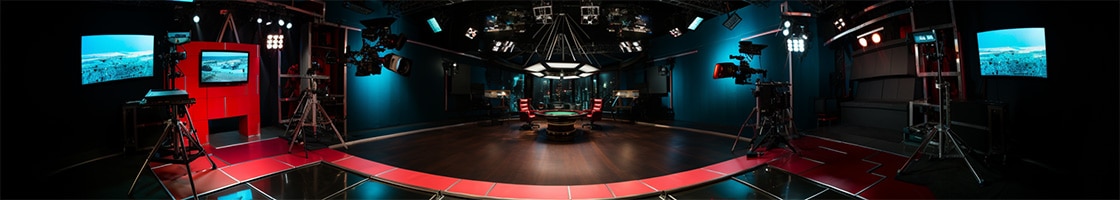 TV studio featuring final table with two chairs