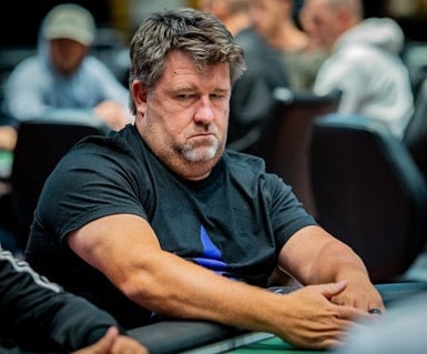 Chris Moneymaker at a table
